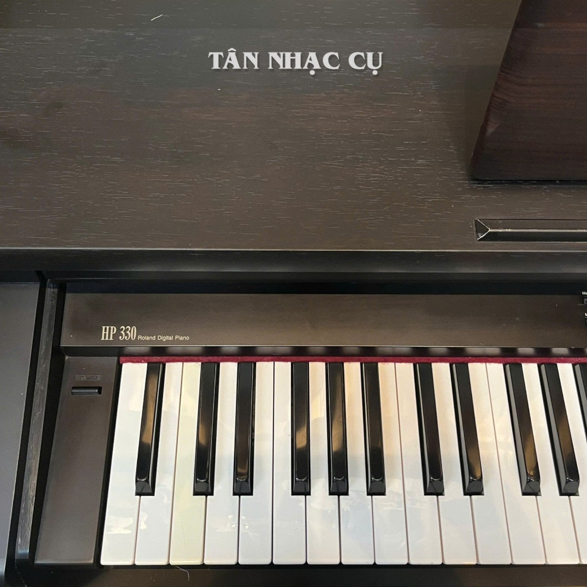 Đàn piano điện TÂN NHẠC CỤ Roland HP330 màu gỗ mun với bàn phím búa weighted 88 phím tiêu chuẩn