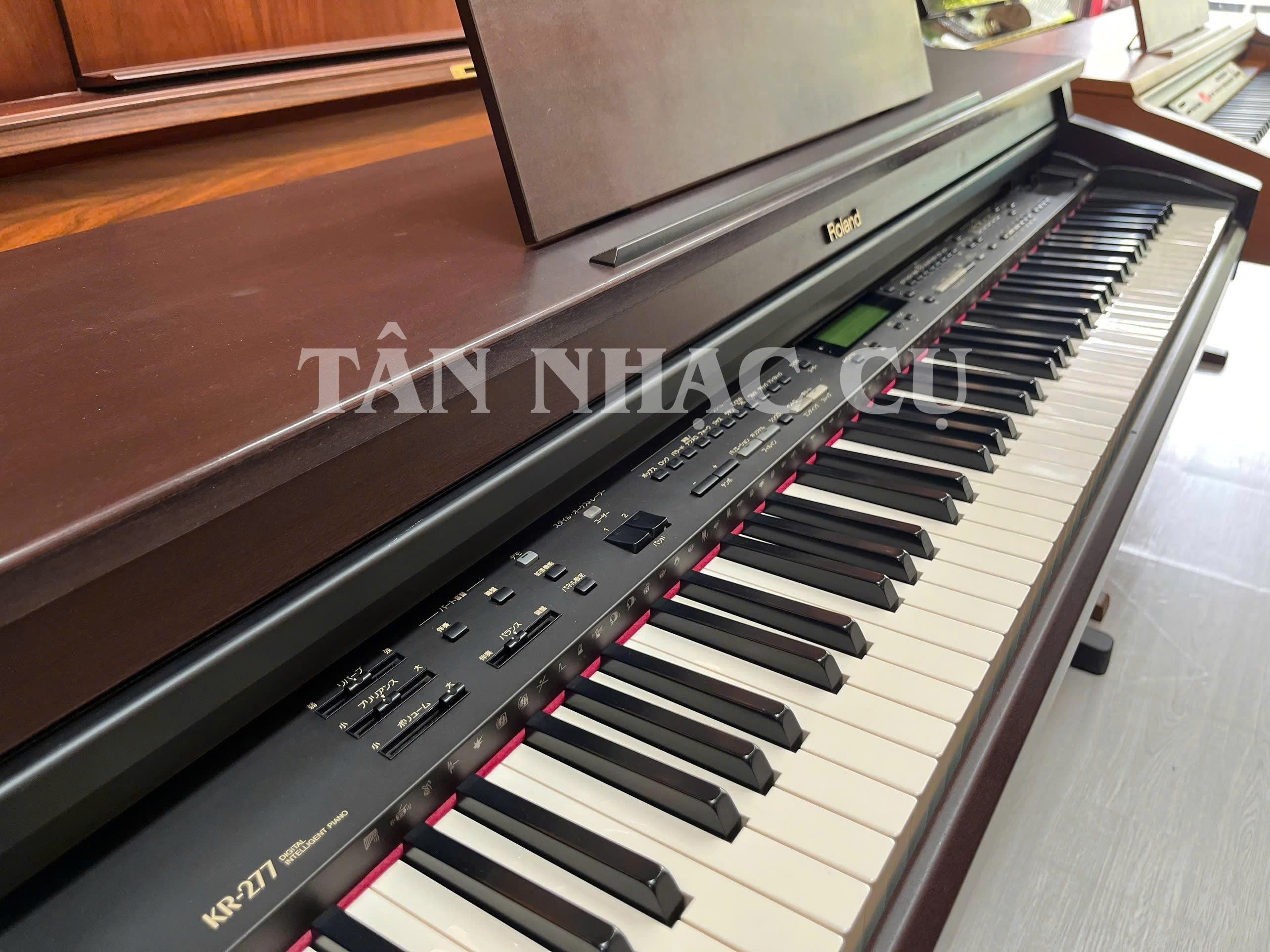 Đàn piano điện Roland KR277 dáng tủ màu gỗ mahogany sang trọng với bàn phím búa 88 phím tại TÂN NHẠC CỤ