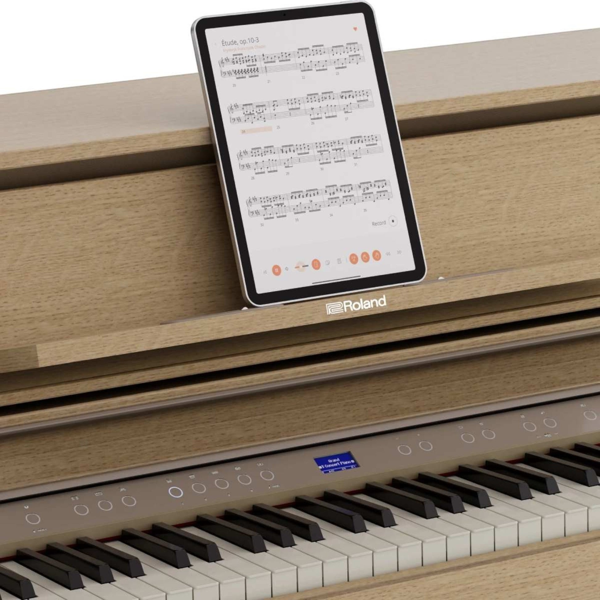 Đàn piano điện Roland LX-5 màu gỗ sồi sáng tại TÂN NHẠC CỤ với máy tính bảng đặt trên giá nhạc