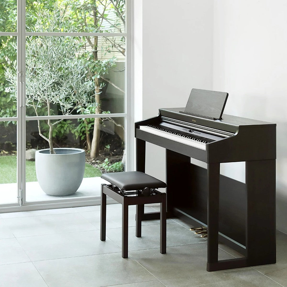 Đàn piano điện Roland RP701 màu đen dáng tủ sang trọng tại TÂN NHẠC CỤ, thiết kế hiện đại phù hợp không gian gia đình