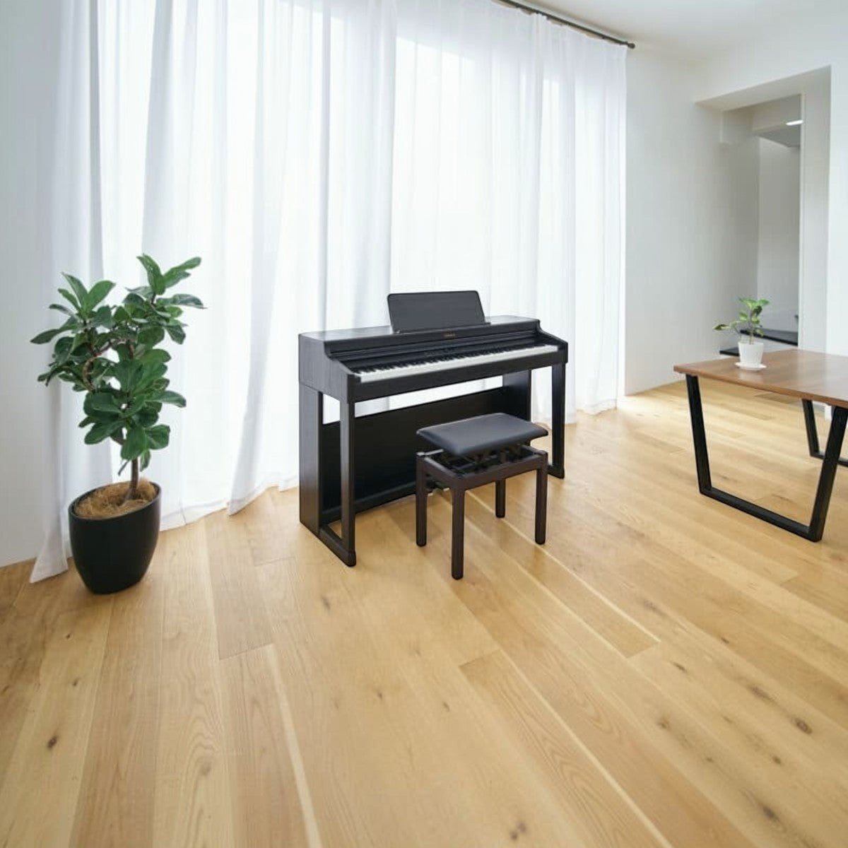 Đàn piano điện TÂN NHẠC CỤ Roland RP701 dáng tủ màu đen sang trọng đặt trong phòng khách hiện đại
