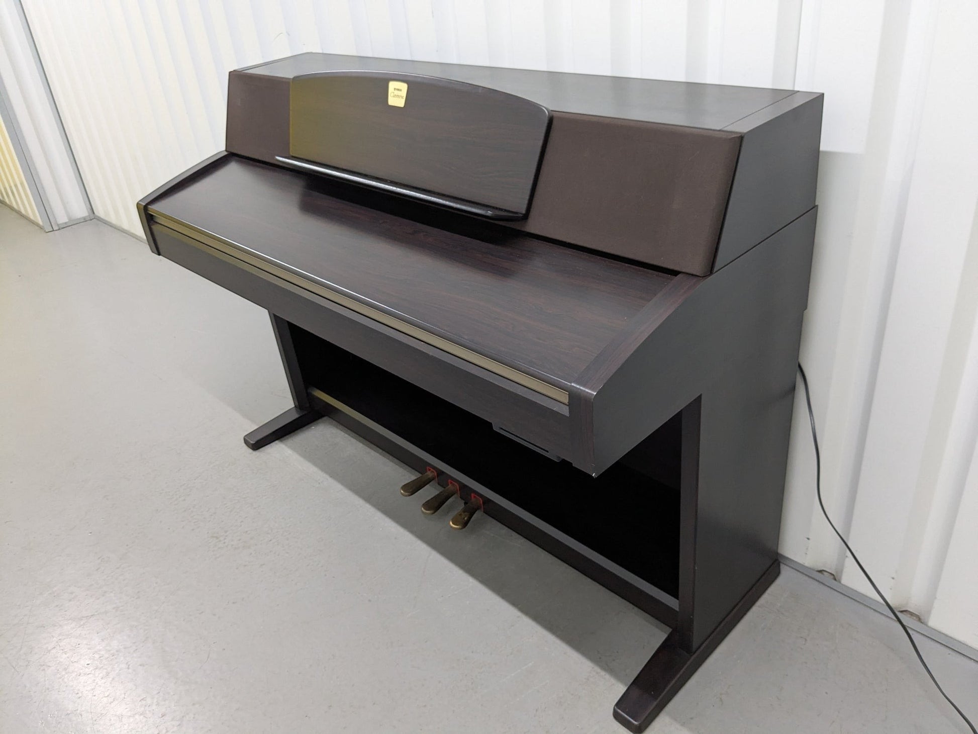 Đàn piano điện Yamaha CLP-970 màu gỗ tối sang trọng tại cửa hàng TÂN NHẠC CỤ