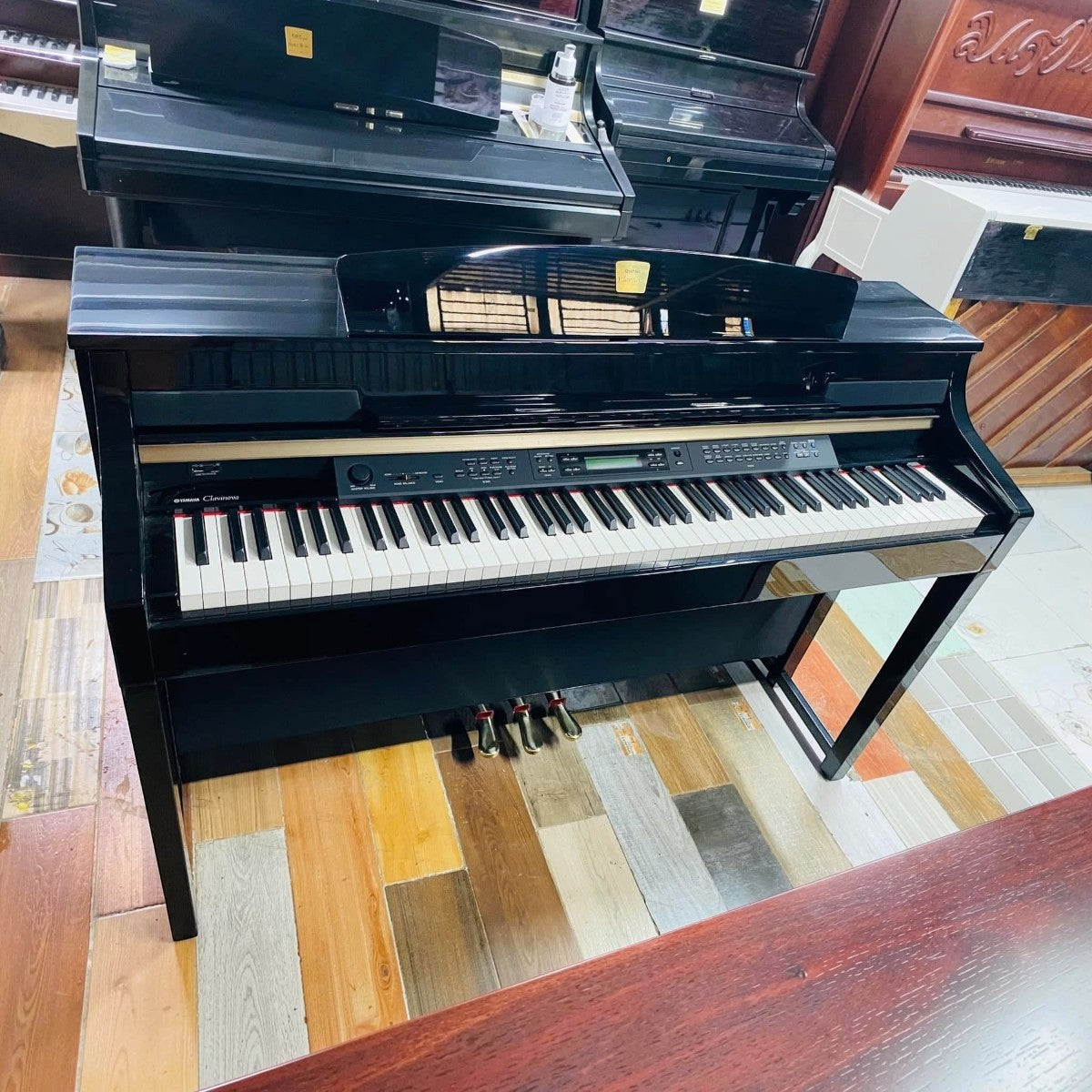 Đàn piano điện TÂN NHẠC CỤ Yamaha CLP-380 màu đen bóng, bàn phím gỗ Natural Wood sang trọng và hiện đại