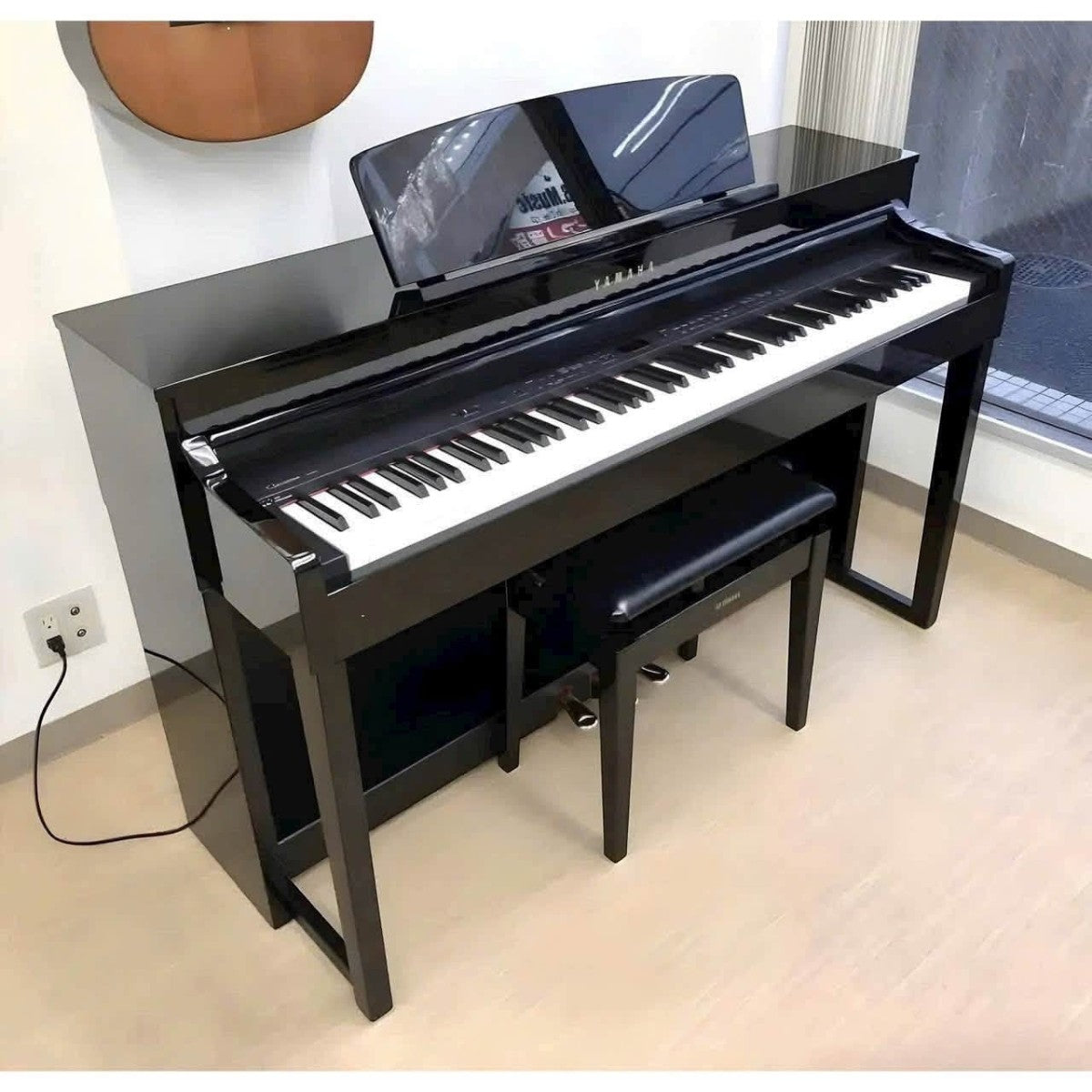 Đàn piano điện Yamaha CLP470 màu đen sang trọng với bàn phím gỗ tự nhiên tại TÂN NHẠC CỤ
