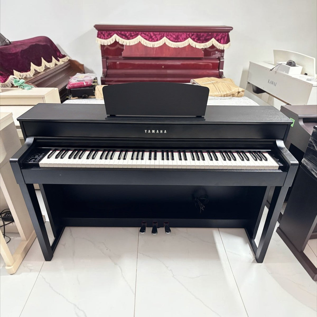 Đàn piano điện Yamaha CLP535 màu đen tại showroom TÂN NHẠC CỤ với thiết kế sang trọng và bàn phím GH3X cao cấp