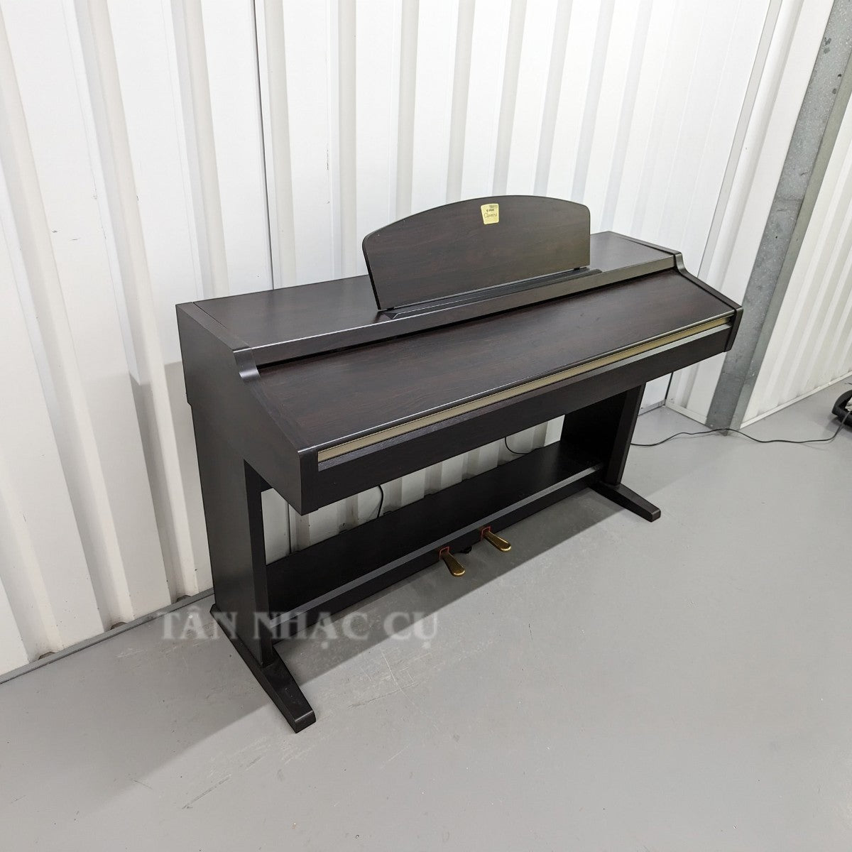 Đàn piano điện Yamaha CLP920 dáng tủ màu nâu gỗ sang trọng tại TÂN NHẠC CỤ
