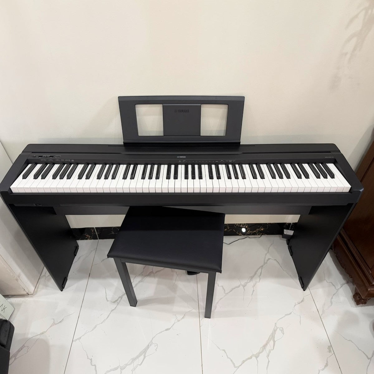 Đàn piano điện Yamaha P45 cũ màu đen tại Tân Nhạc Cụ, bàn phím 88 phím GHS, thiết kế gọn gàng cho người mới bắt đầu.