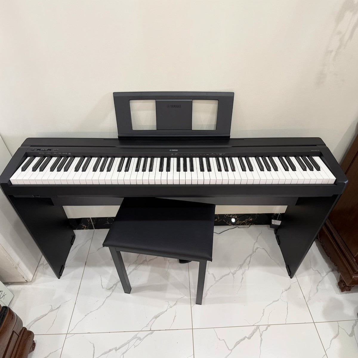 Đàn piano điện Yamaha P45 cũ màu đen tại Tân Nhạc Cụ, bàn phím 88 phím GHS, thiết kế gọn gàng cho người mới học.