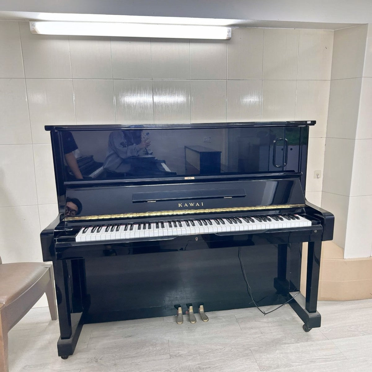 Đàn piano cơ upright Kawai NS15 màu đen bóng sang trọng tại TÂN NHẠC CỤ