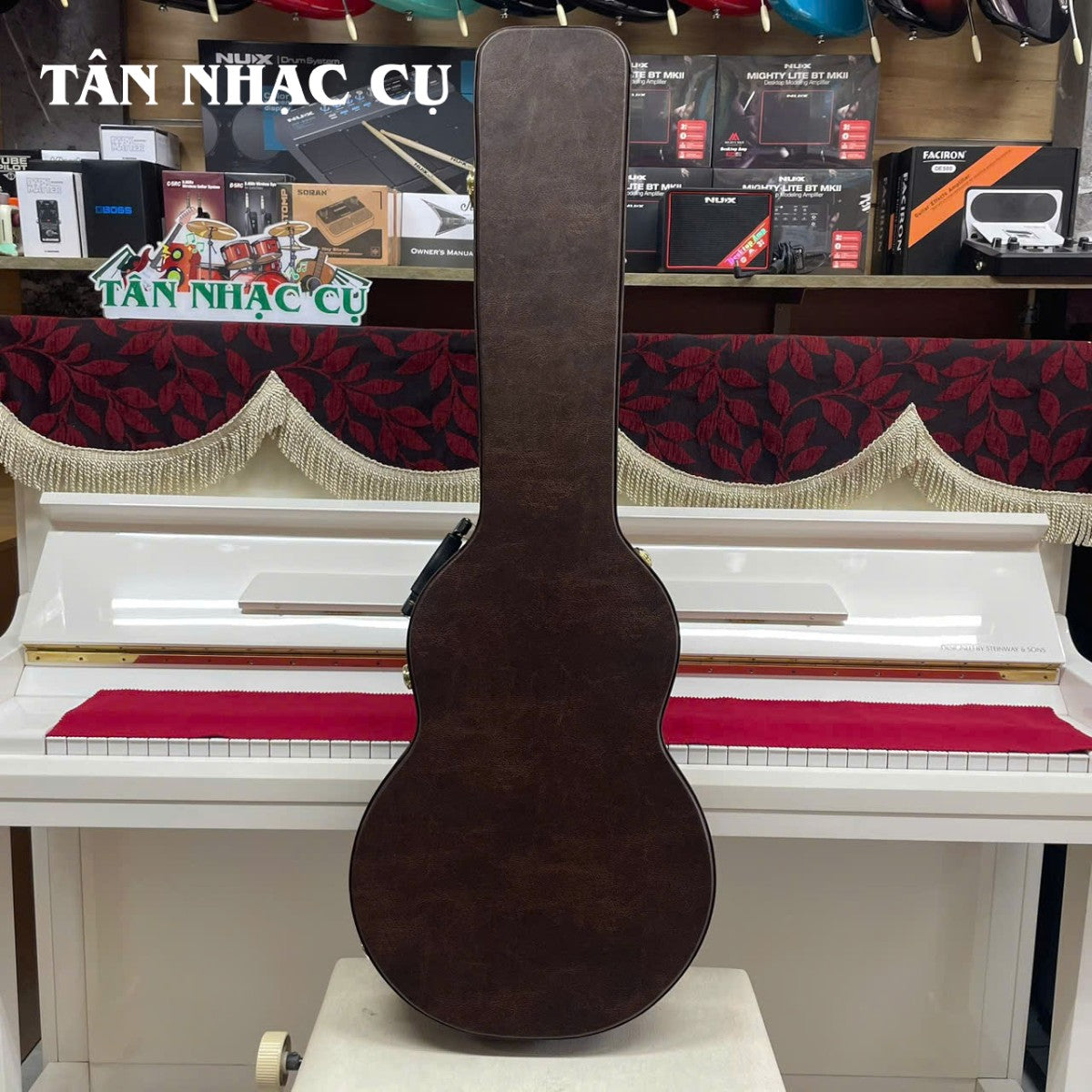 Hộp cứng guitar điện dáng Les Paul màu nâu từ TÂN NHẠC CỤ với thiết kế vỏ cứng bền bỉ bảo vệ nhạc cụ tối ưu