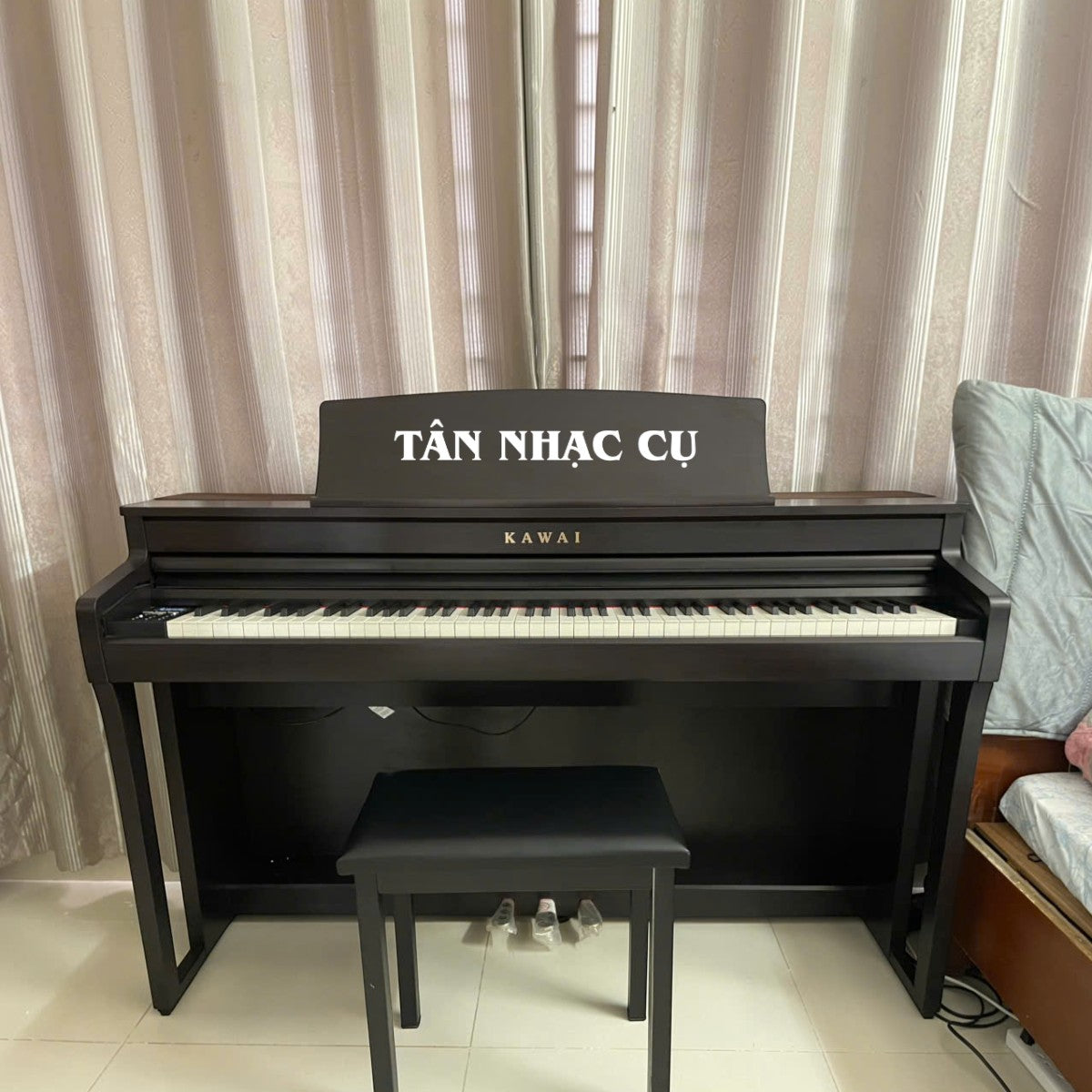 Đàn piano điện TÂN NHẠC CỤ Kawai CA59 màu đen với bàn phím gỗ Grand Feel Compact cao cấp
