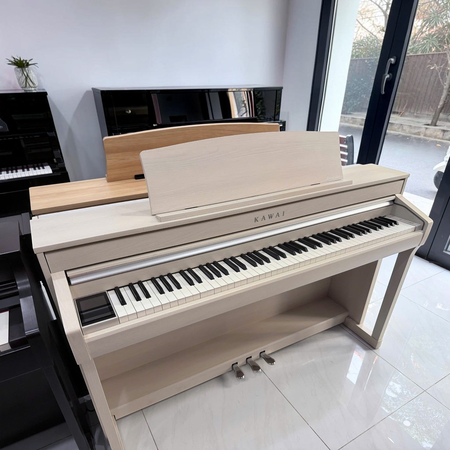 Đàn piano điện TÂN NHẠC CỤ Kawai CA78 màu trắng satin dáng tủ cao cấp với bàn phím gỗ Grand Feel II