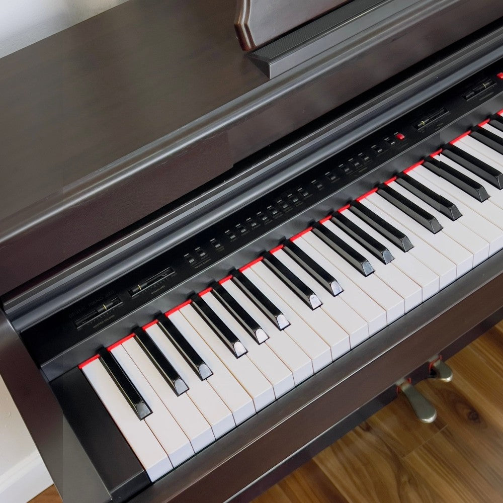Đàn piano điện Kawai PW820 cũ màu nâu đen với bàn phím gỗ tại TÂN NHẠC CỤ