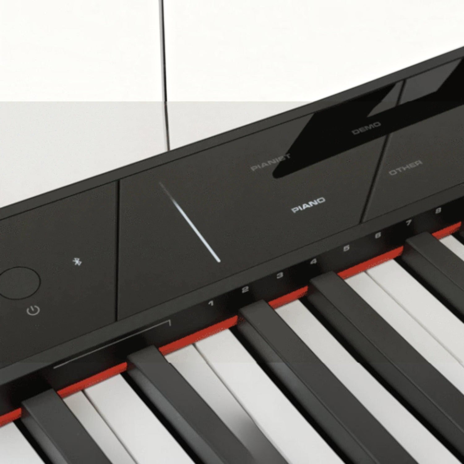 Bảng điều khiển cảm ứng hiện đại trên đàn piano điện Nux NPK200 tại TÂN NHẠC CỤ với các nút chức năng và phím đàn