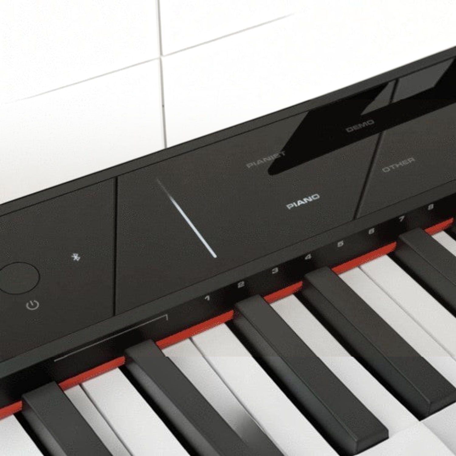 Bảng điều khiển cảm ứng hiện đại trên đàn piano điện TÂN NHẠC CỤ Nux NPK200 với thanh trượt điều chỉnh âm lượng