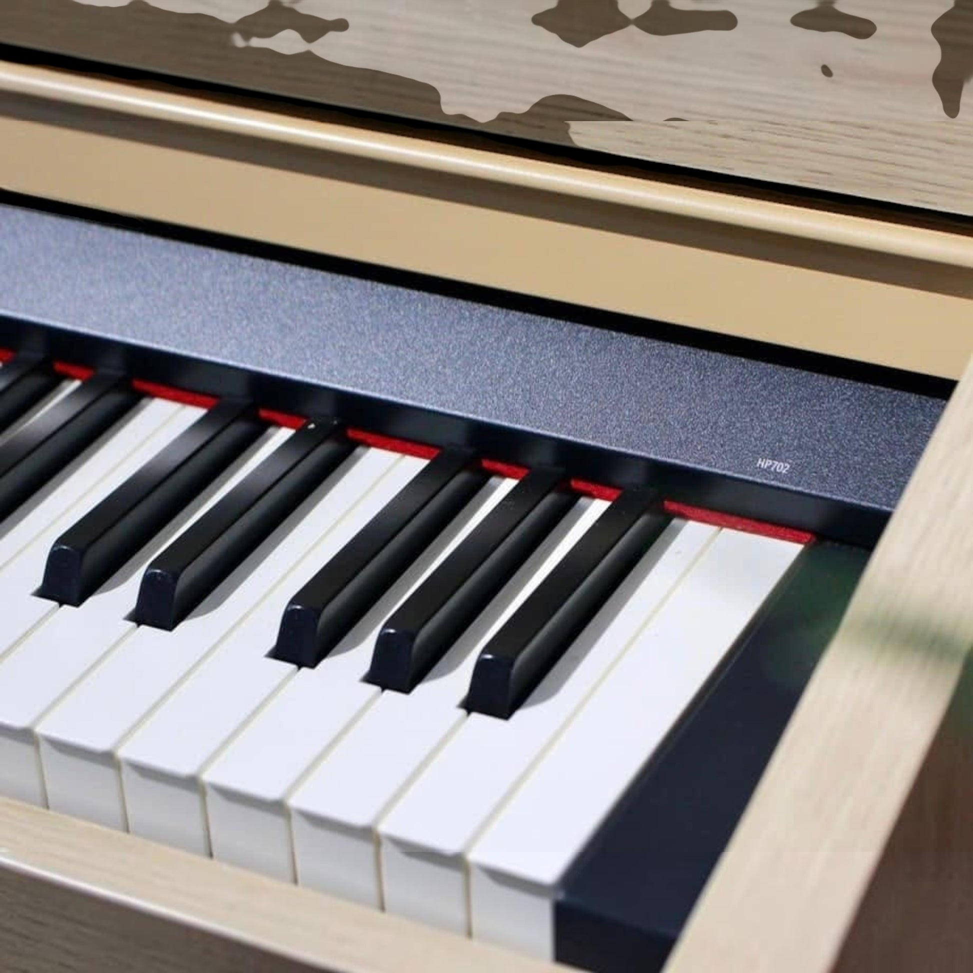 Bàn phím đàn piano điện Roland HP702 tại TÂN NHẠC CỤ với thiết kế phím búa PHA-4 màu mun và ngà sang trọng