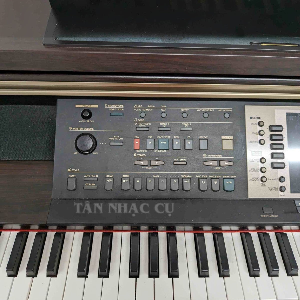 Bảng điều khiển đàn piano điện TÂN NHẠC CỤ Yamaha CVP-207 với các nút chức năng, màn hình và phím đàn màu nâu gỗ