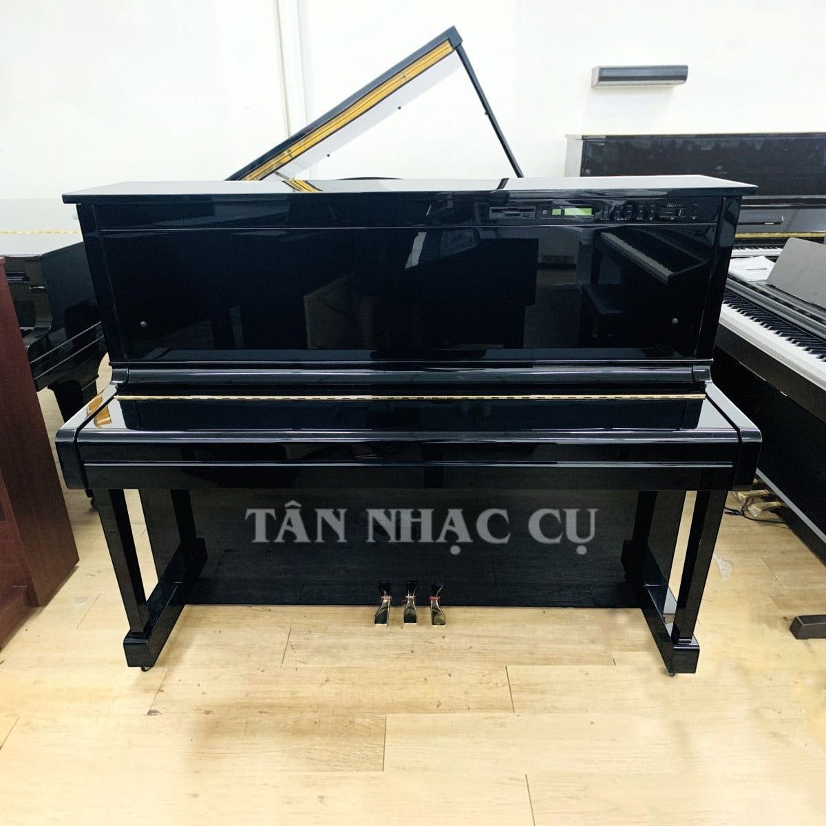 Đàn piano cơ Yamaha SX100RBL màu đen bóng sang trọng có tính năng tự chơi tại TÂN NHẠC CỤ